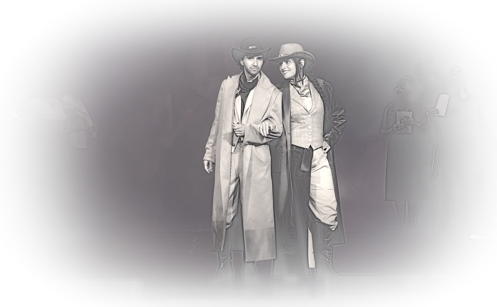 In a crowd scene under stage light