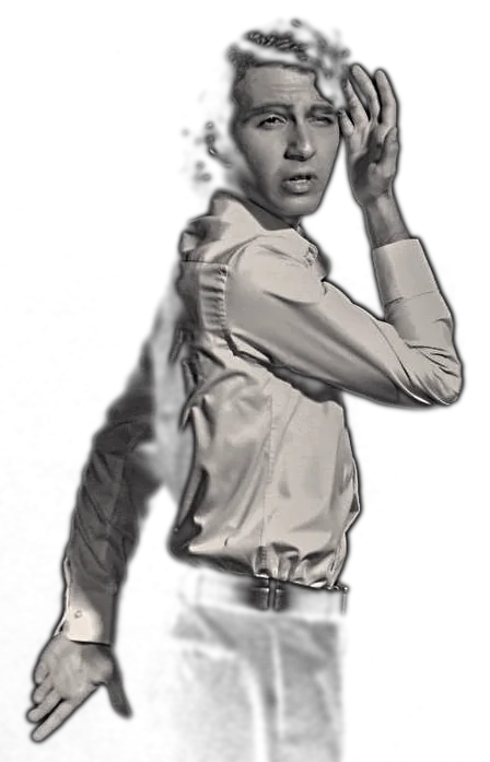 Standing in a spotlight, one hand raised to the head