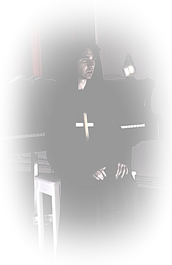 In costume, seated at a piano on a dark stage